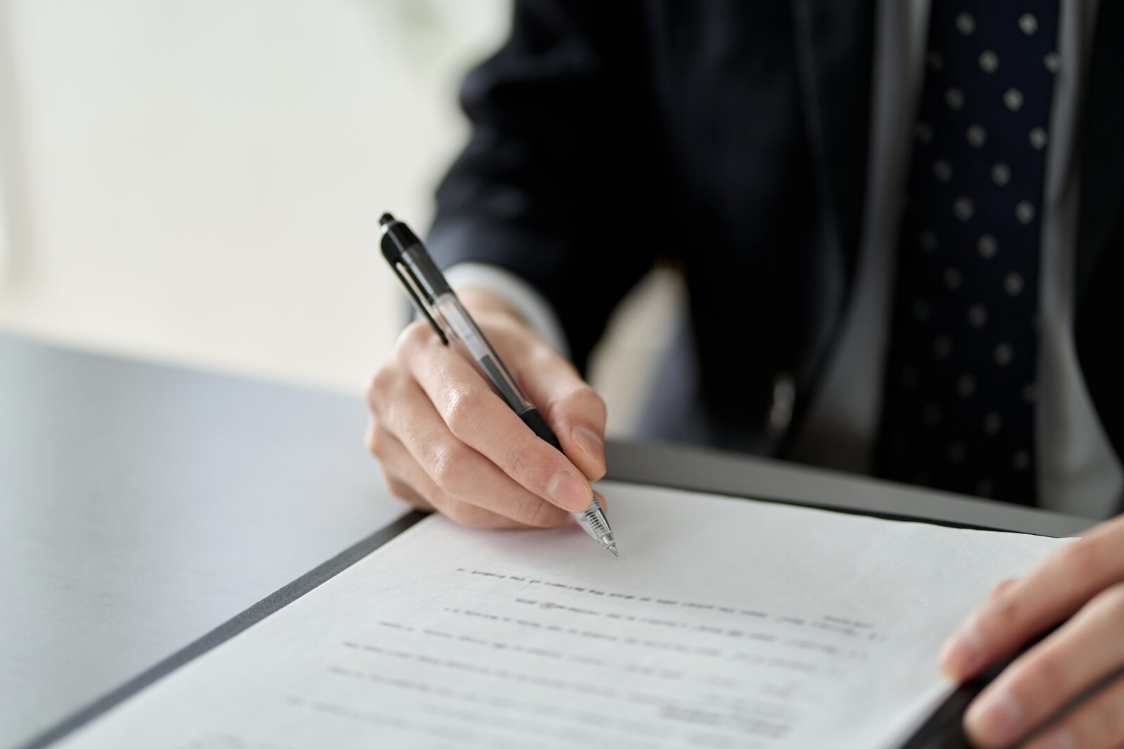 A title professional reviewing property paperwork