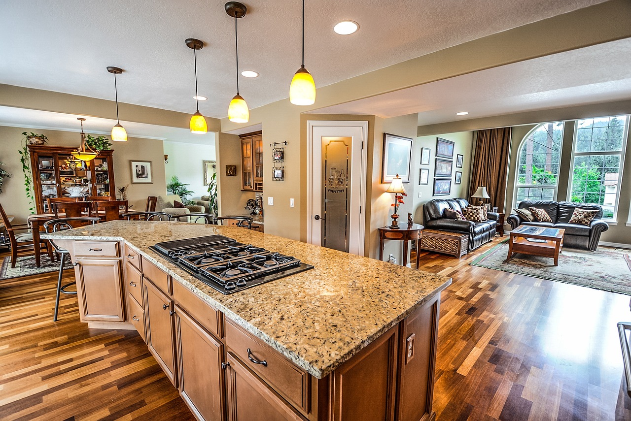 An updated kitchen with granite counters that adds resale value