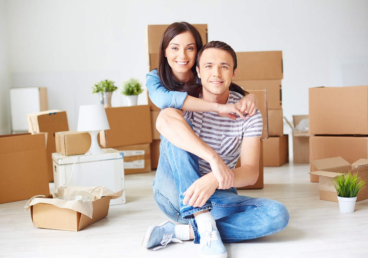 A couple settling into their new home