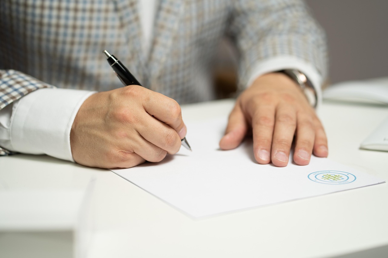 Signing title insurance documents at closing